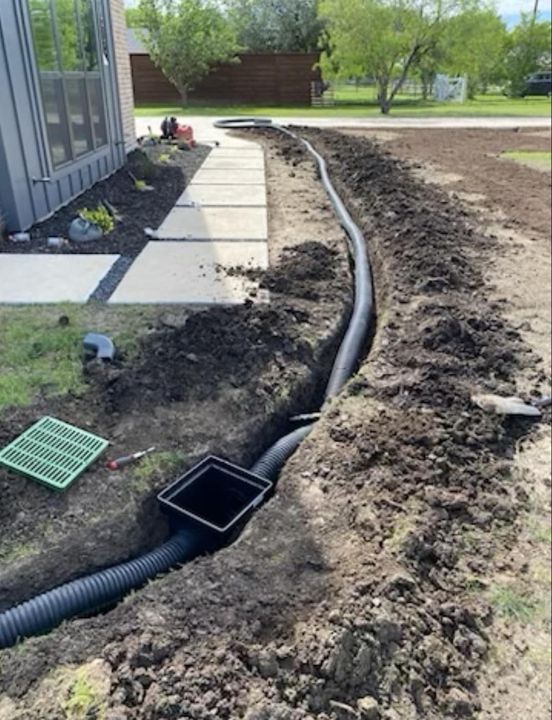 French drain and catch basin installation