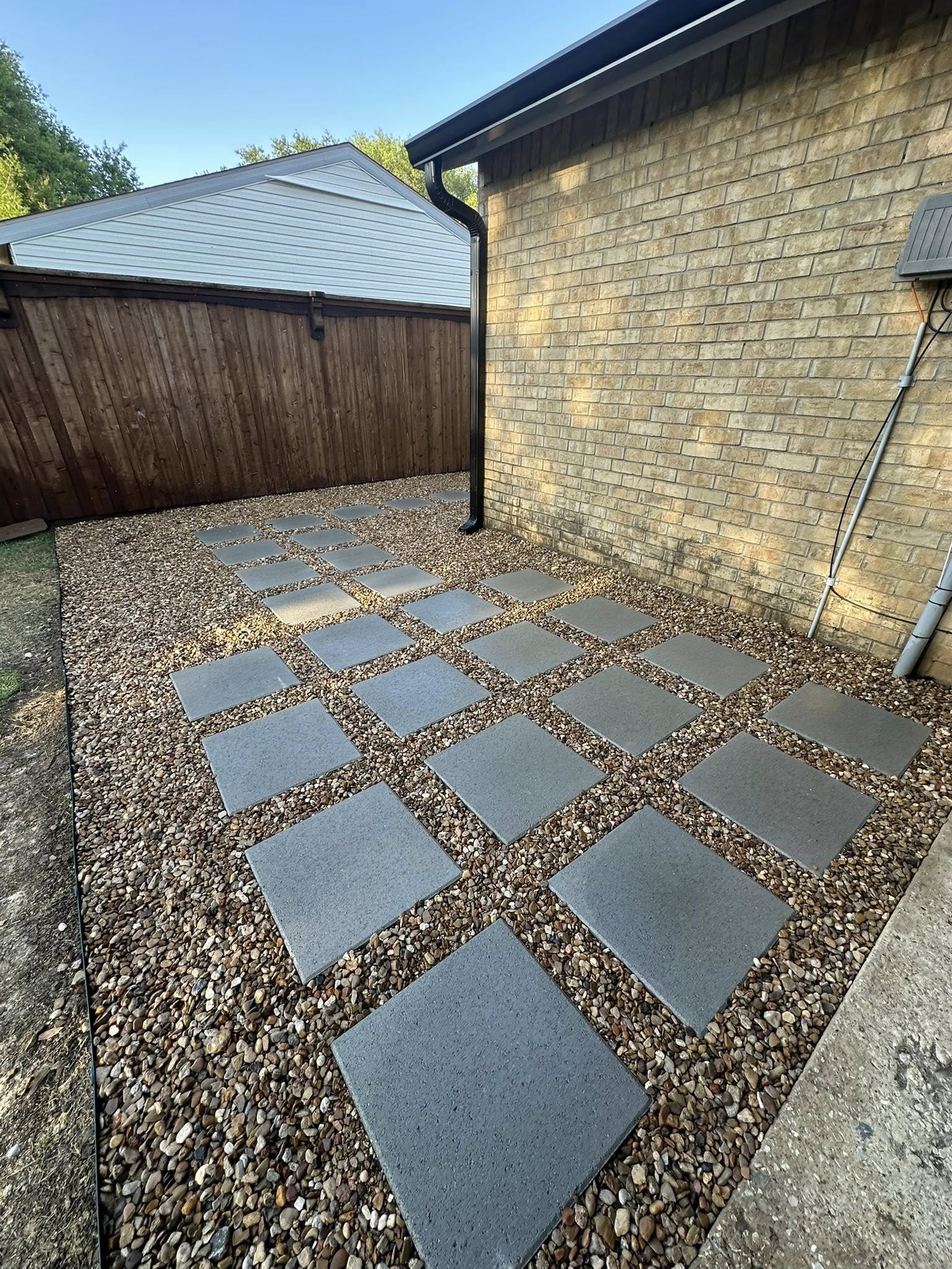 Paver patio with decorative gravel fill