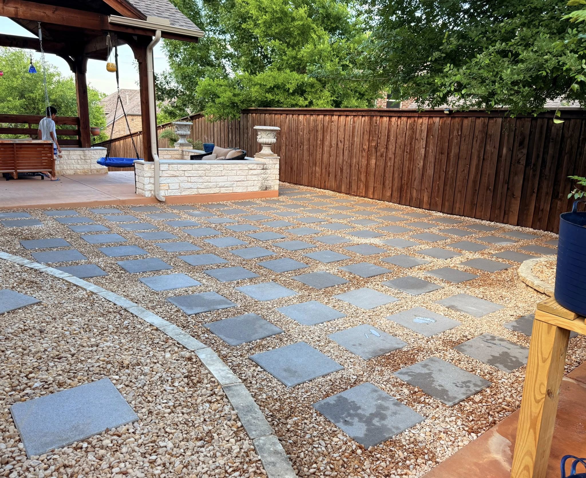 Backyard paver stepping stones with gravel