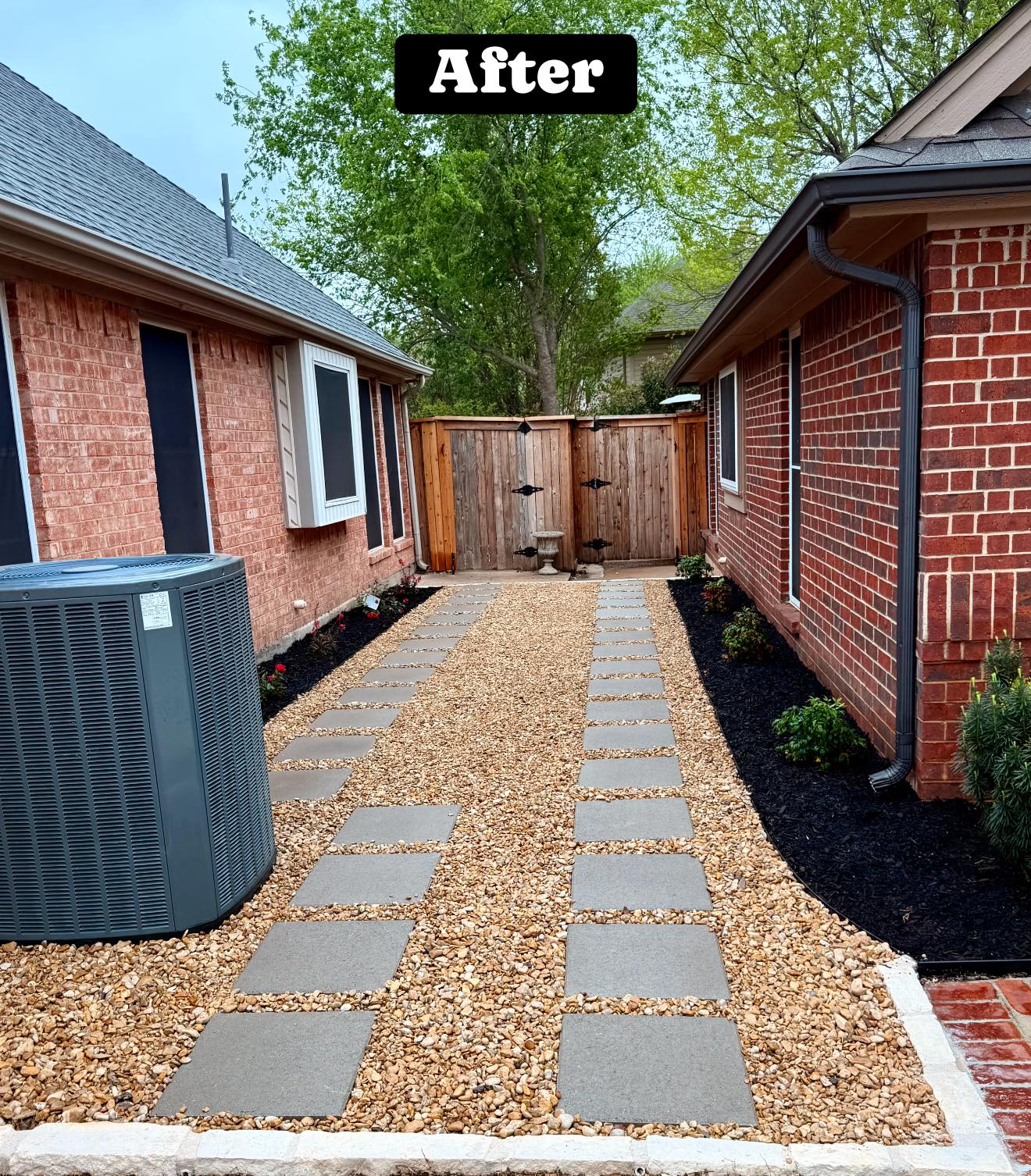 After - side yard paver walkway with gravel and mulch border